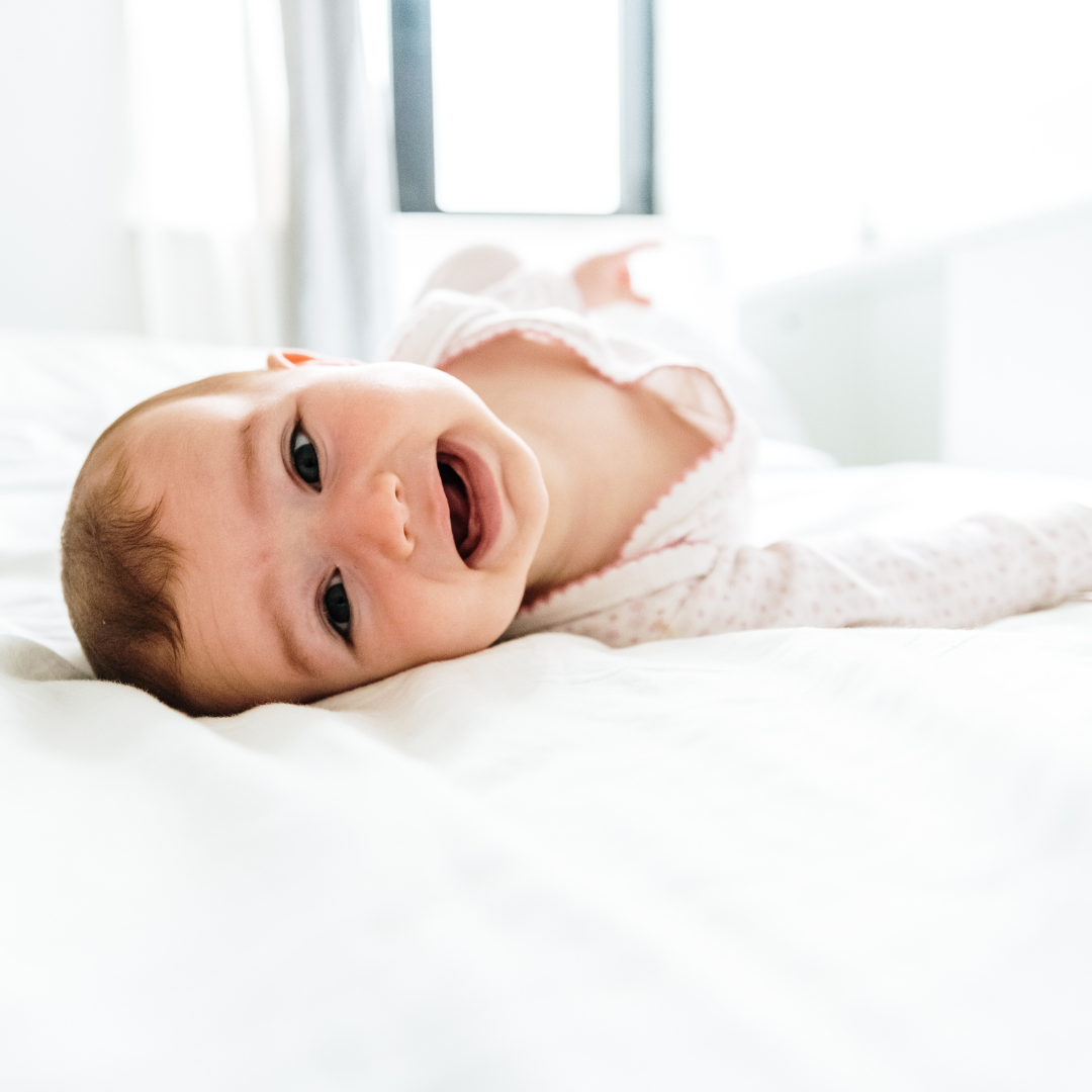 When Do Babies Roll Over? Celebrating Baby's First Year The Milky Tee